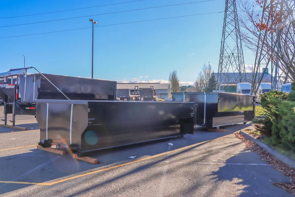 Roll-off dumpster ready for waste disposal at job site for 2 Yard Dumpster Rental in Paramount